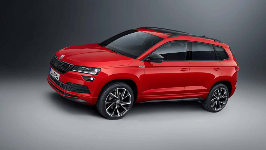 Vibrant Red Skoda Karoq Wallpaper: Stylish Modern Design Background