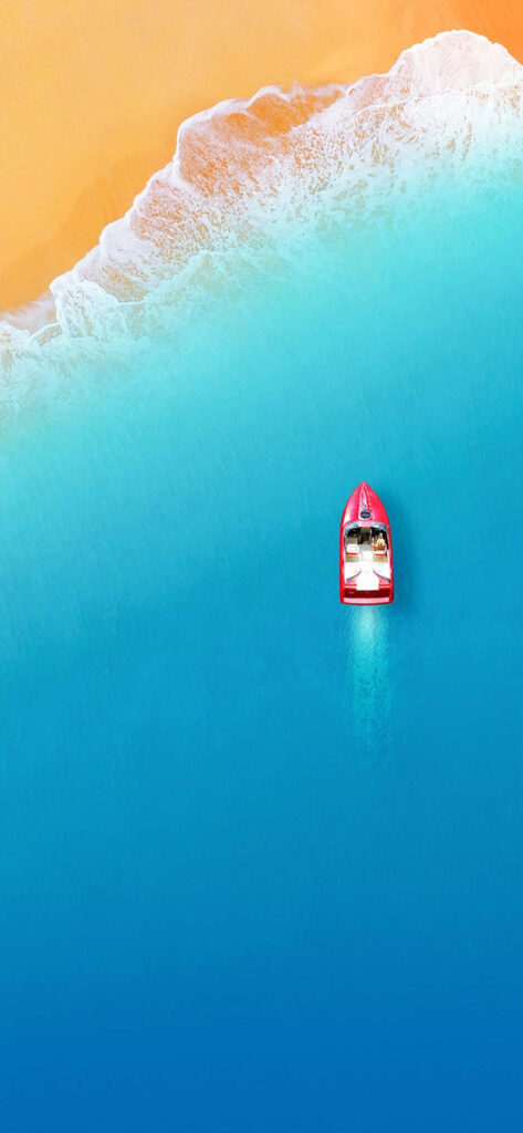 Vibrant Red Speedboat in Turquoise Waters - Minimalist Wallpaper