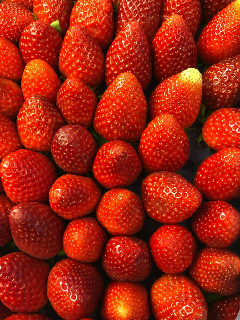 Juicy Red Strawberries Wallpaper: Fresh and Luscious Background