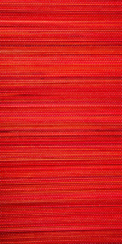 Bold Red Textured Wallpaper with Yellow Undertones