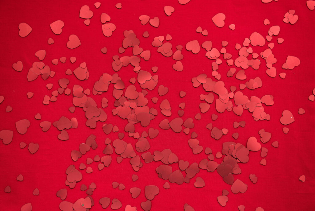 Charming Red Heart Wallpaper: Perfect for Romantic Designs