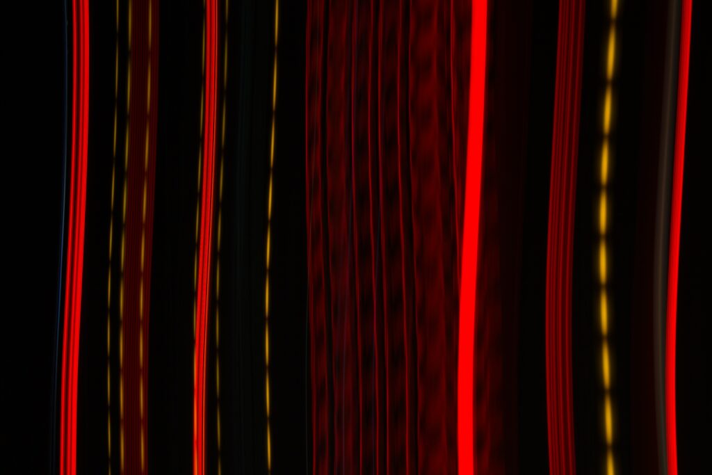 Vibrant Red & Yellow Abstract Wallpaper with Wavy Lines and Stripes