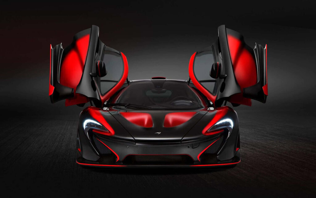 Captivating Color Contrast: Vibrant Red and Black McLaren Car Background with Striking Texture Wallpaper
