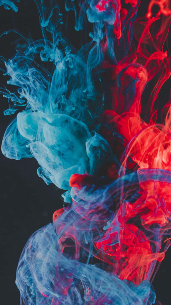 Vibrant Smoke Dance: Captivating Red and Blue iPhone Wallpaper