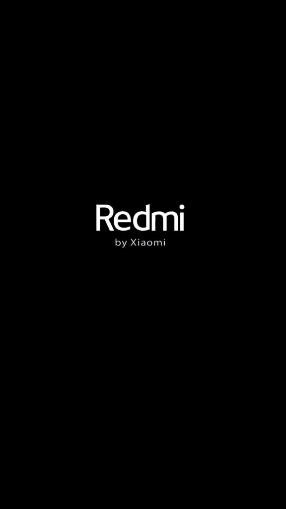 Stunning HD Wallpaper: Redmi Logo Shines on Vibrant Background