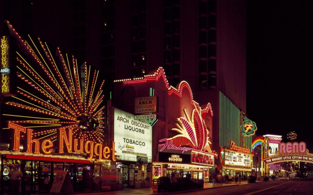 Vibrant Reno Strip Neon Lights Wallpaper Background