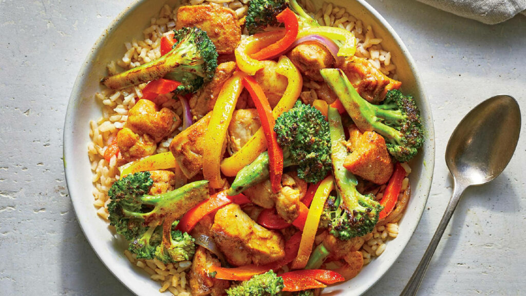 Vibrant Rice & Yellow Curry Dish - Colorful Meal Wallpaper