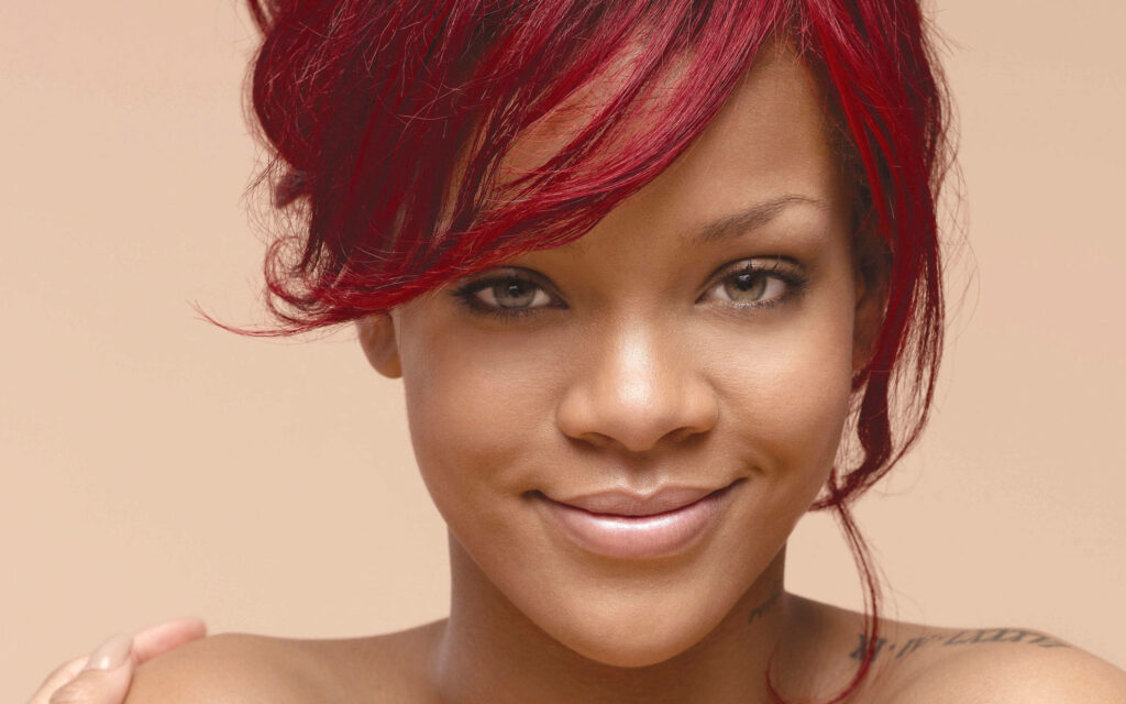 Vibrant Rihanna Wallpaper: Smiling Charm & Red Hair Elegance