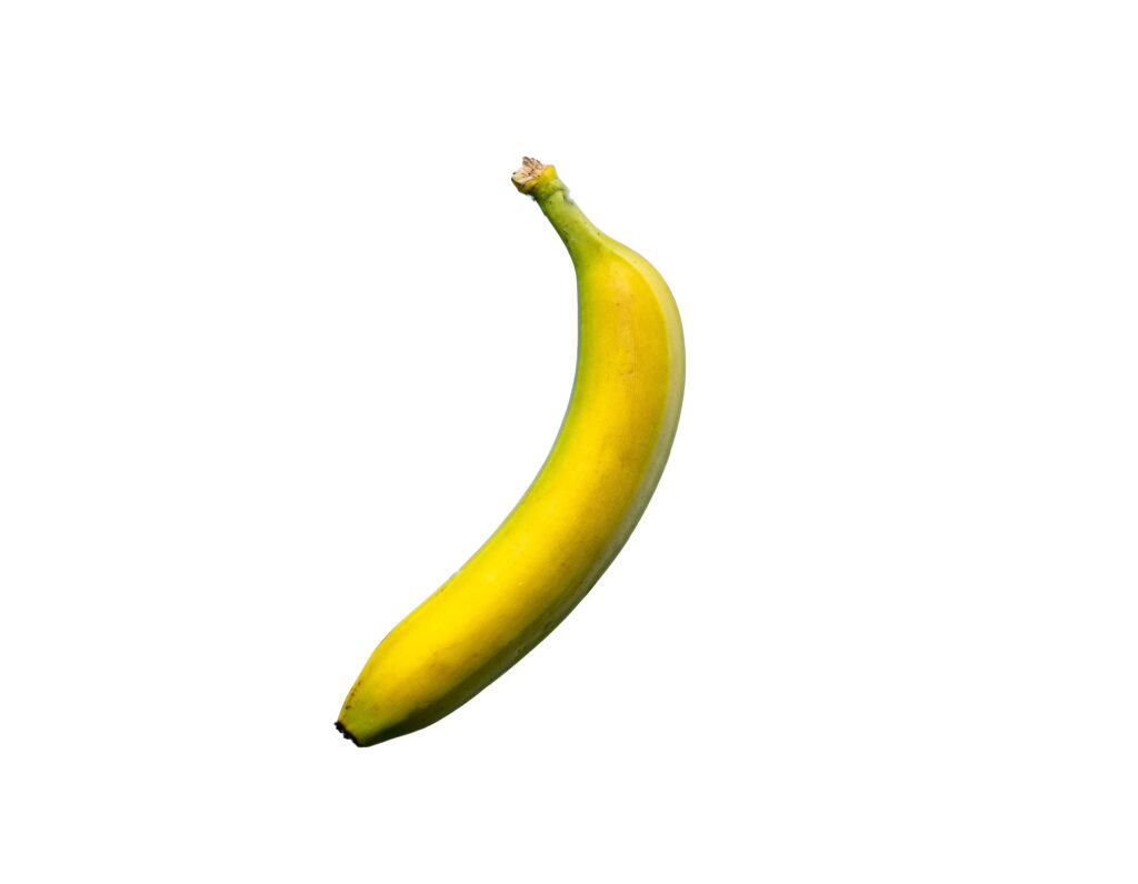 Ripe vibrant yellow banana isolated on white background perfect for wallpaper or healthy snack