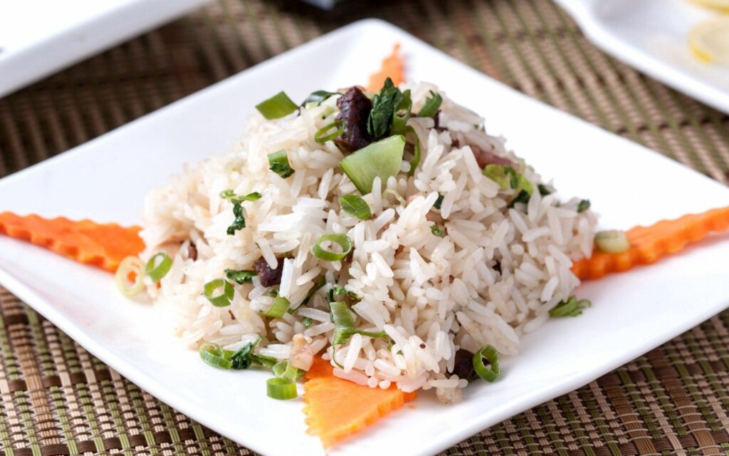 Vibrant Risotto Dish with Fresh Veggies - Inviting Wallpaper Background