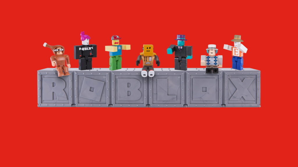 Digital Adventure: Vibrant Roblox Avatars Embrace the Red Gaming Realm in Stunning HD Wallpaper