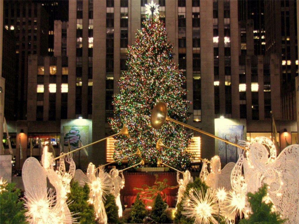 Magical Rockefeller Center Christmas Tree and Festive Winter Scene Wallpaper