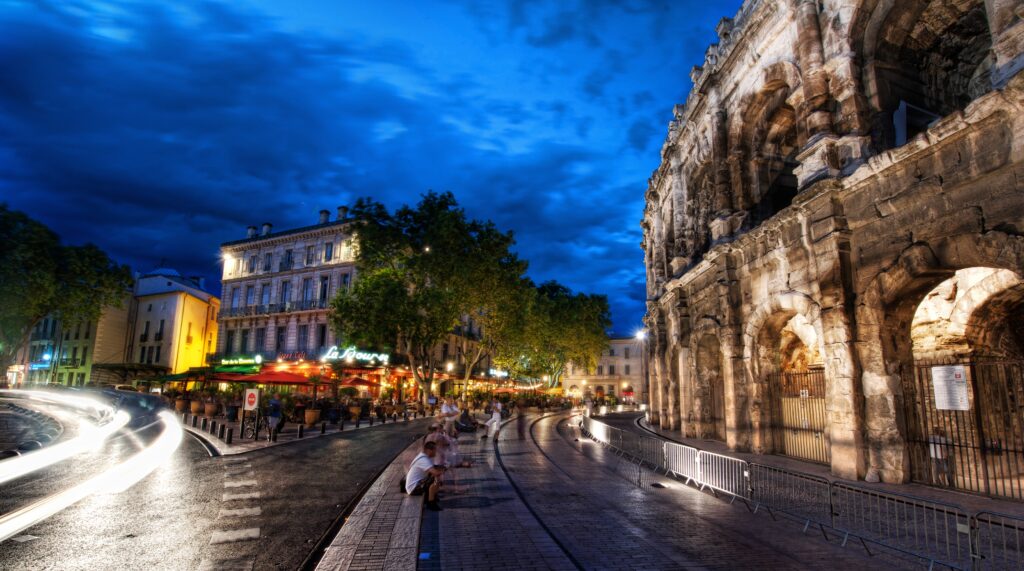 Vibrant Rome Evening Wallpaper: Coliseum & City Lights