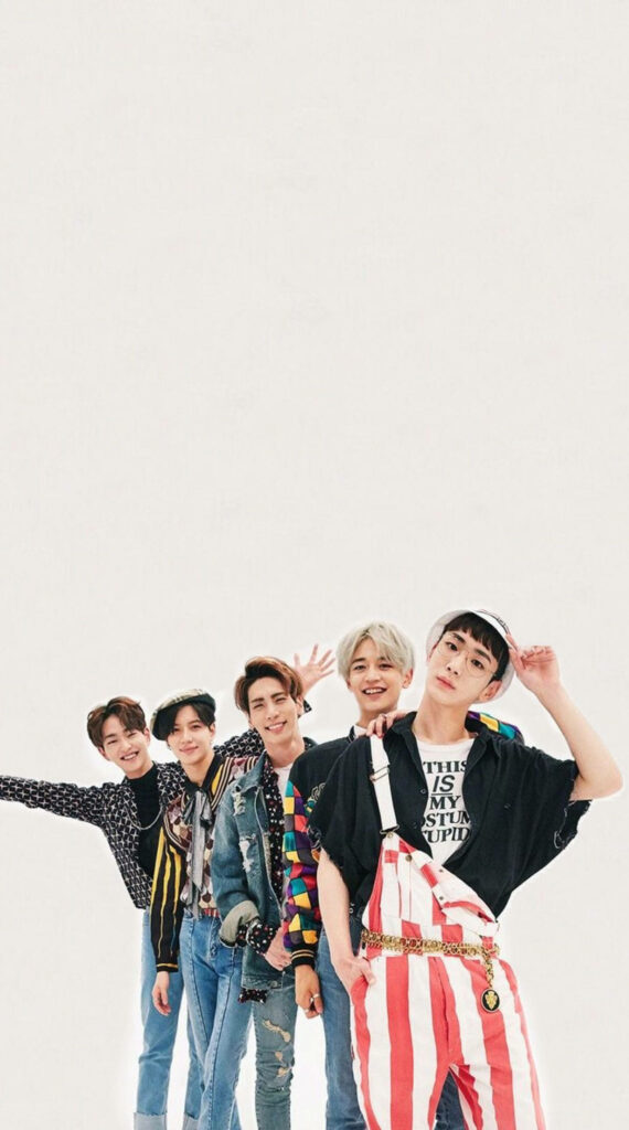 Vibrant SHINee Wallpaper: K-POP Group in Fun, Cheerful Pose