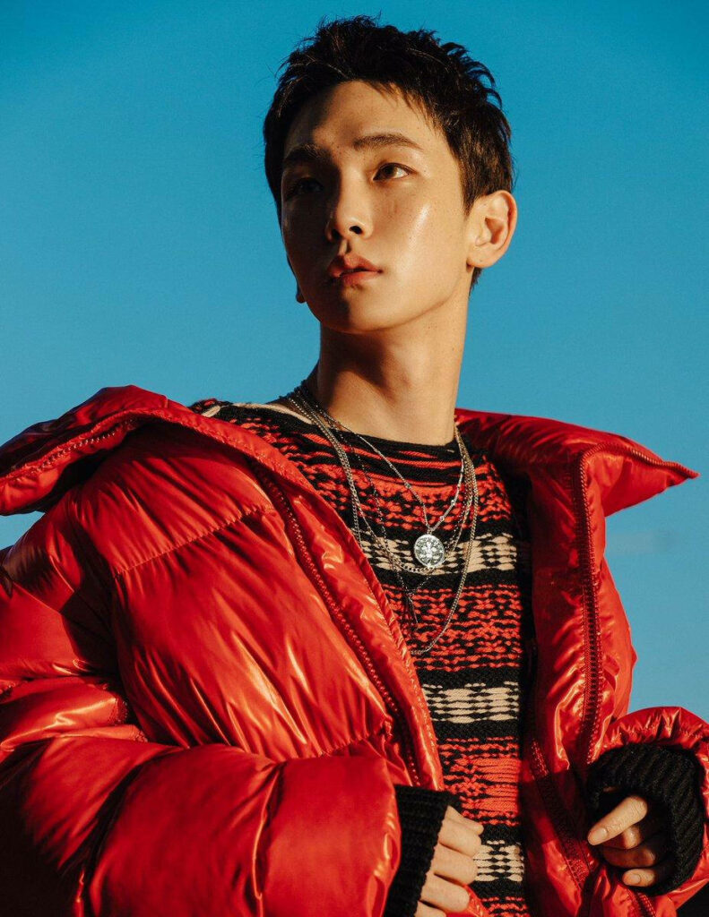 Stylish K-POP Wallpaper: SHINee's Key in Bold Red Outdoors