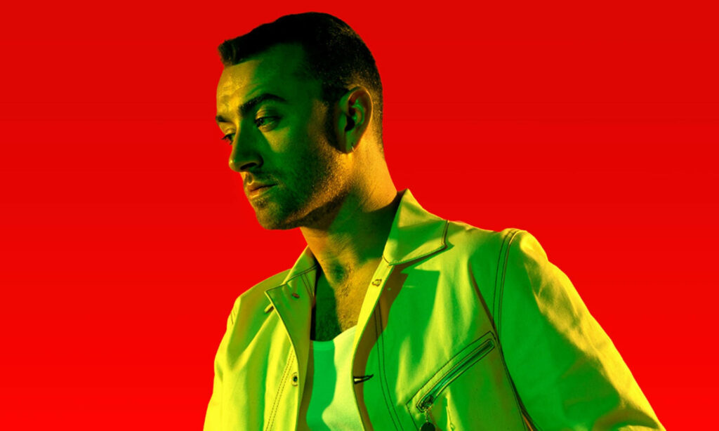 Stylish Sam Smith Wallpaper: Bold Red Background & Charisma
