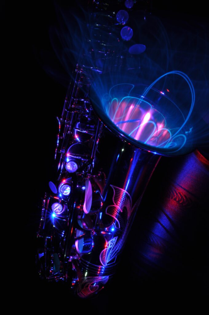 Vibrant Saxophone Wallpaper: Glowing Neon Abstract Design