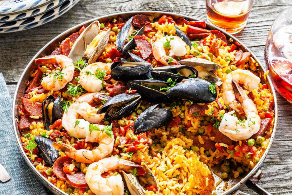 Vibrant Seafood Paella Wallpaper: Shrimp, Mussels & Vegetables