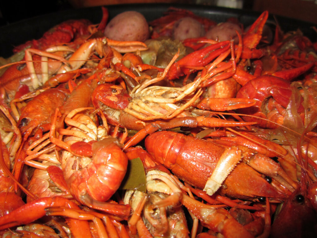Vibrant Seafood Feast Wallpaper: Shrimp, Crayfish & Potatoes Delight