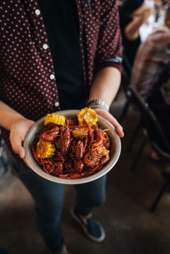 Vibrant Seafood Wallpaper: Buttered Crayfish & Corn Delight