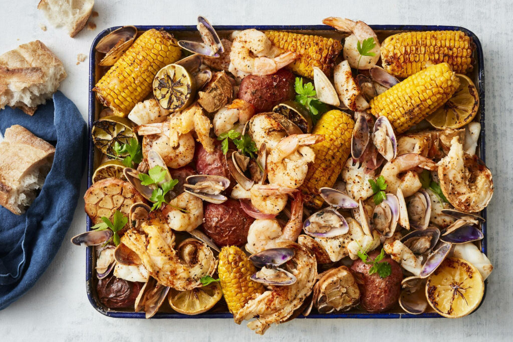 Rustic Seafood Delight Wallpaper: Shrimp, Clams & Corn on Cob