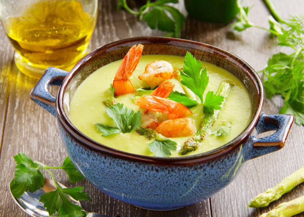Vibrant Shrimp Yellow Curry Wallpaper in Rustic Blue Pot