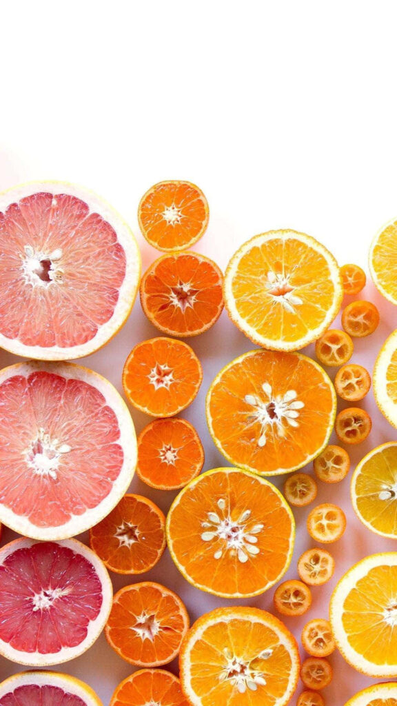 Vibrant Citrus Wallpaper: Juicy Oranges & Grapefruits Pattern