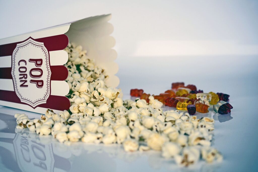 Vibrant Snack-Themed Wallpaper: Popcorn & Gummy Candies