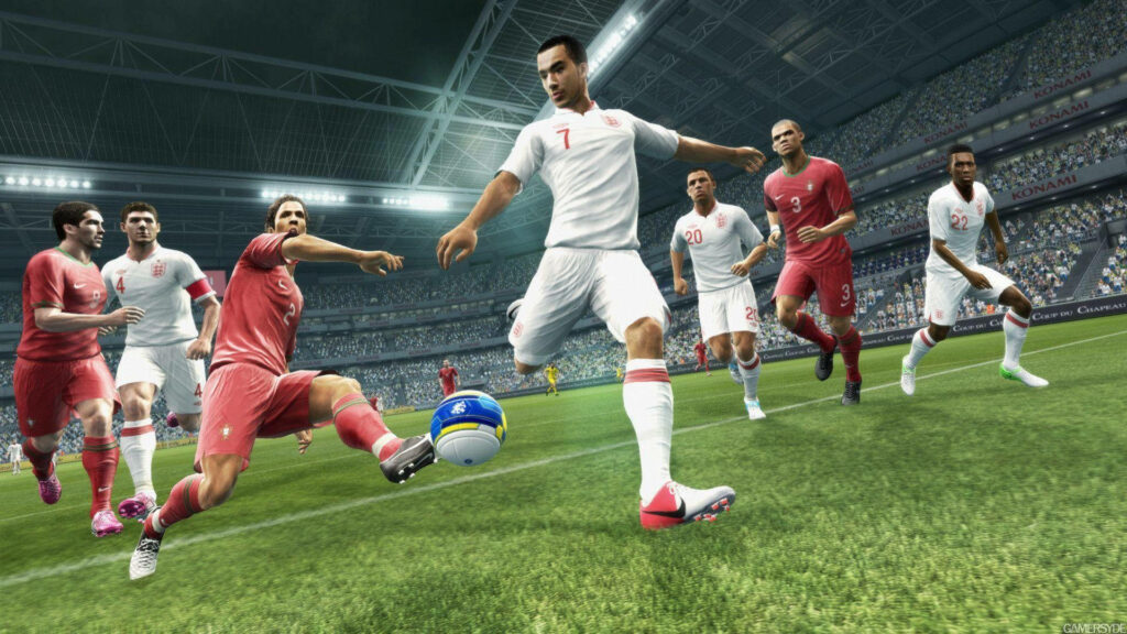 Dynamic Soccer Wallpaper: Intense Match on Vibrant Green Field