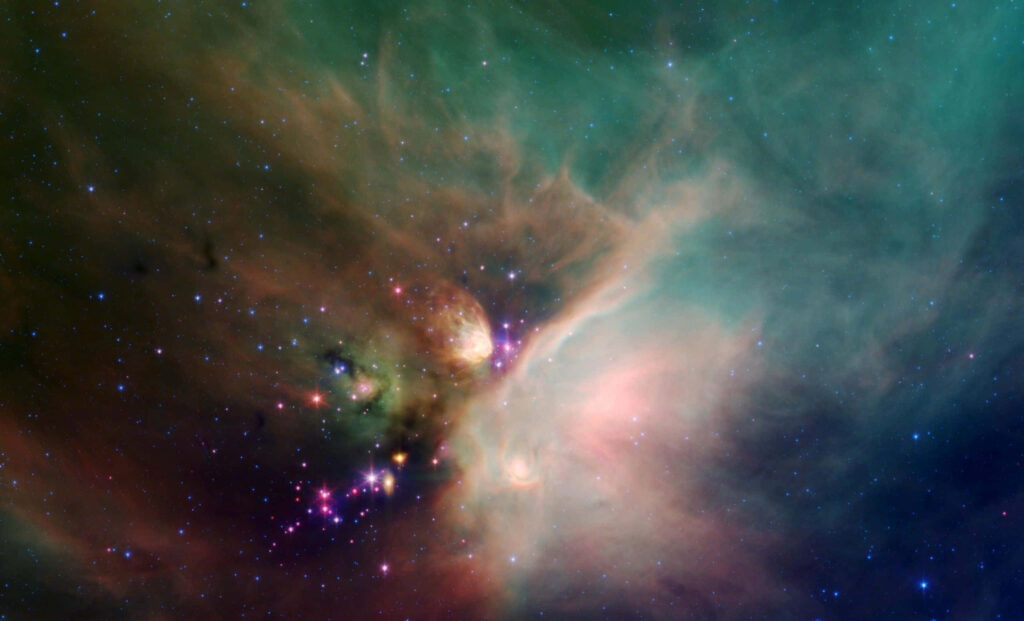Vibrant space nebula wallpaper with swirling colors and sparkling stars in a cosmic design.