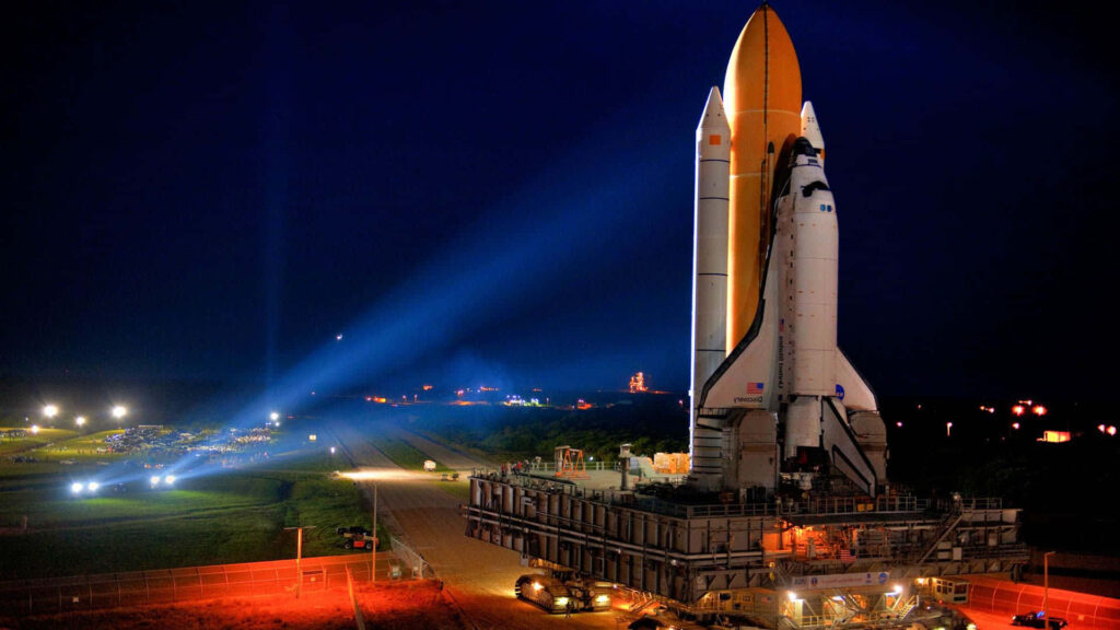 Neon Space Shuttle Wallpaper: Vibrant Launch Scene at Night