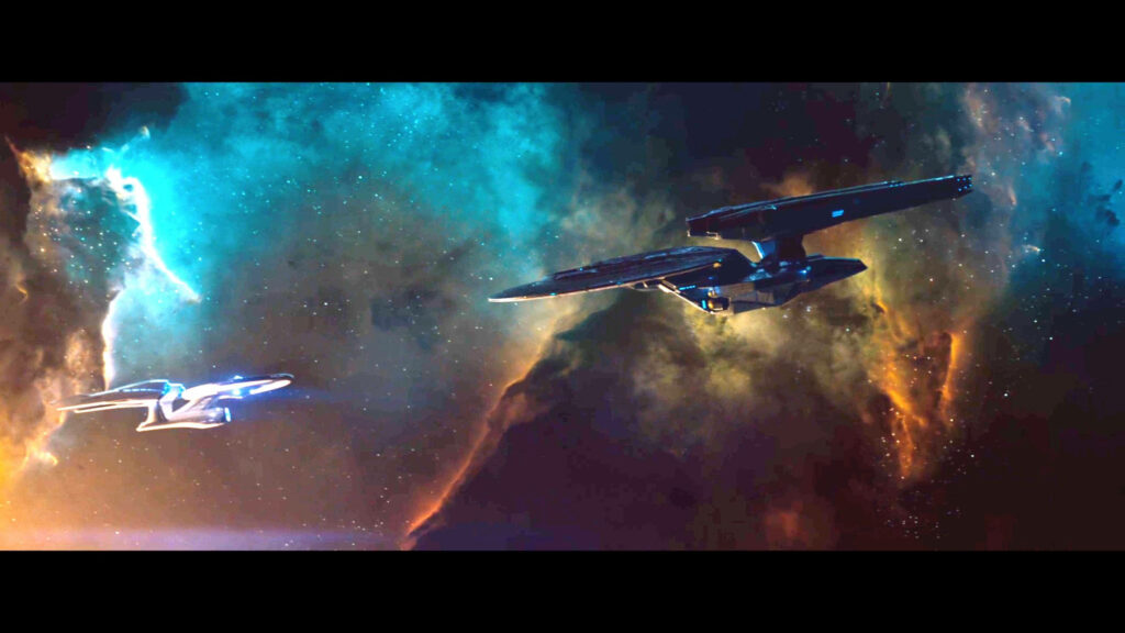 Vibrant Space-Themed Wallpaper: Star Trek Ships vs. Cosmic Nebula