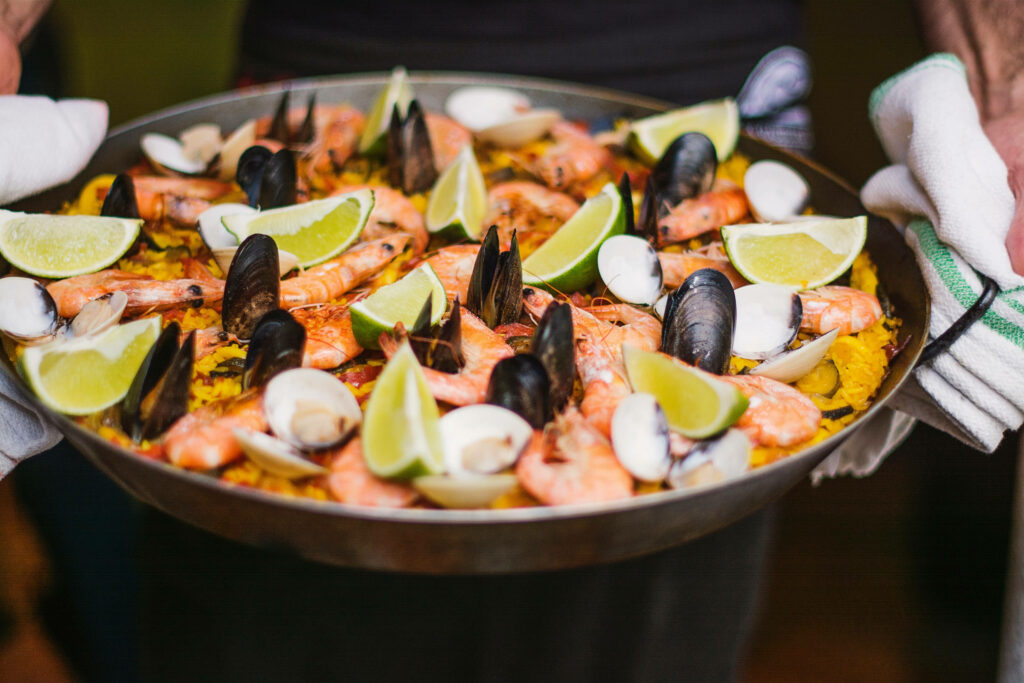 “Vibrant Spanish Paella Wallpaper: Colorful Seafood Culinary Delight”