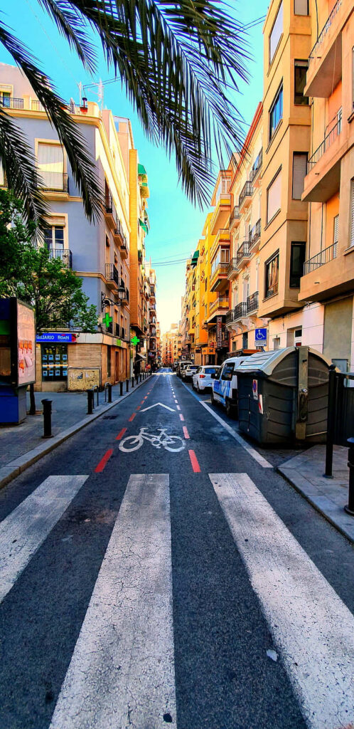 Vibrant Spanish Street Wallpaper: Warm Hues & Lively Culture