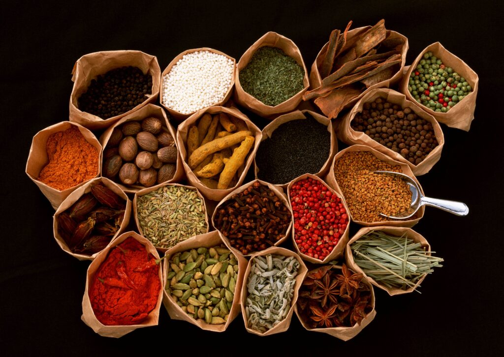 Vibrant Spice Arrangement Wallpaper: Rich Colors & Textures on Black