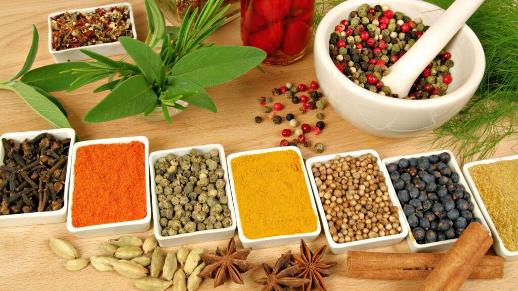 Vibrant Spices & Herbs Wallpaper Background - Colorful Array