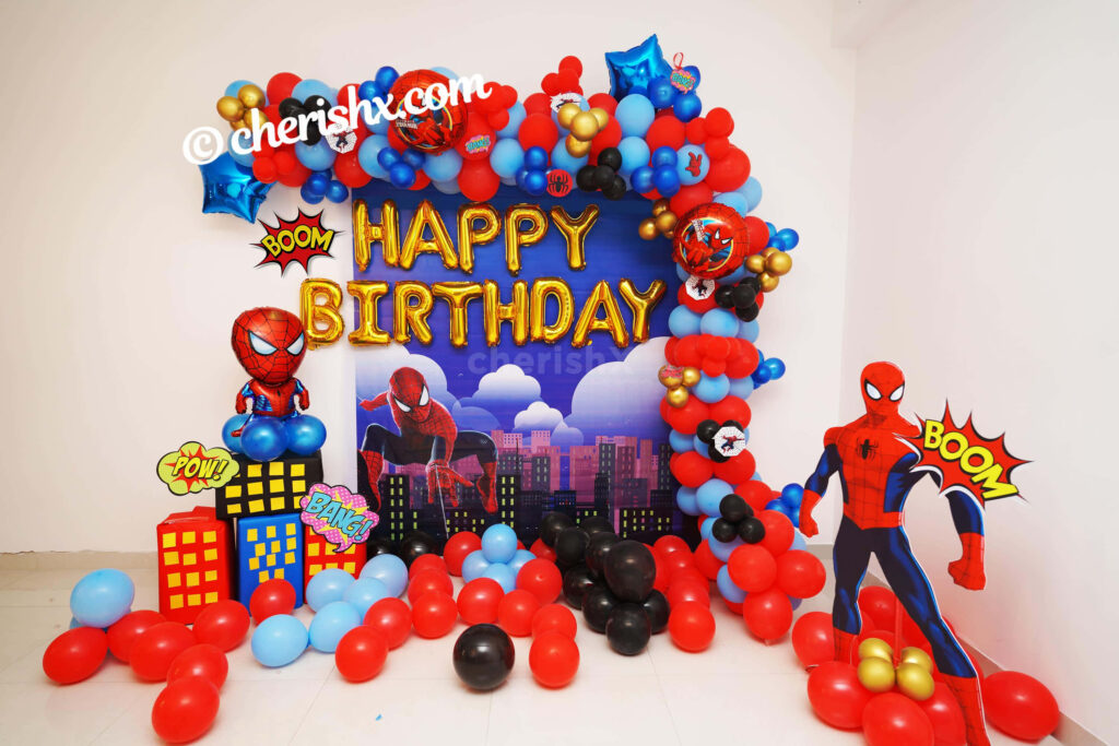 Vibrant Spiderman Birthday Party Setup with Cityscape Background Wallpaper