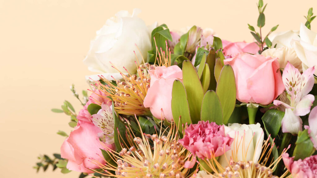 Vibrant Floral Wallpaper: Soft Pink Roses & Unique Blooms on Beige