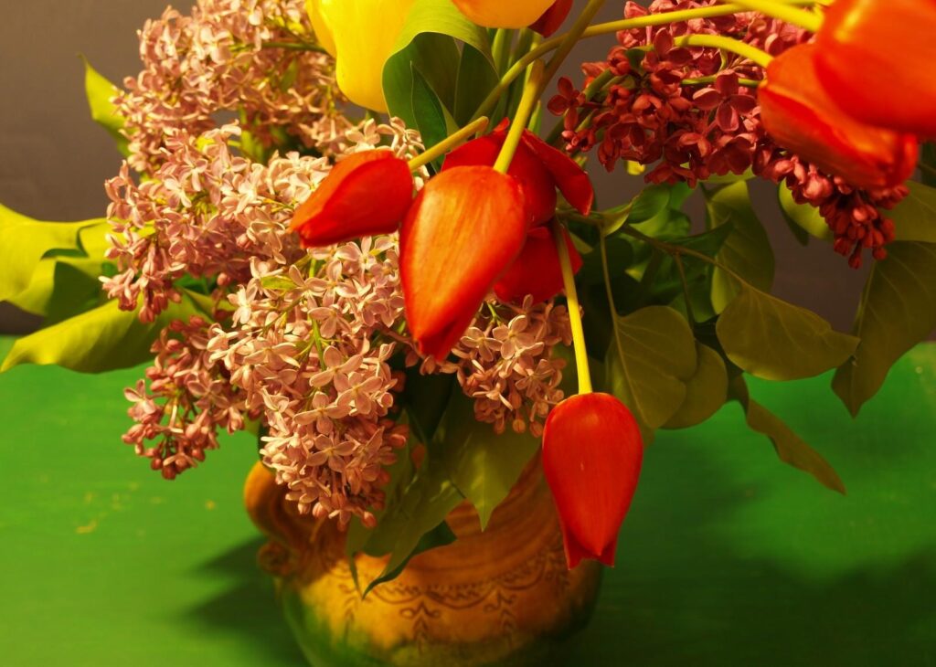 Vibrant Spring Bouquet Wallpaper: Lilacs & Tulips in Decorative Vase