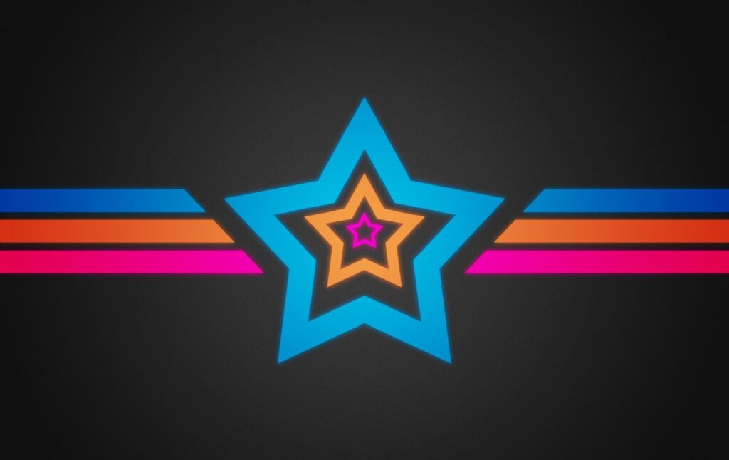 Vibrant Star Motif Wallpaper: Bold Multicolor Design on Dark Background