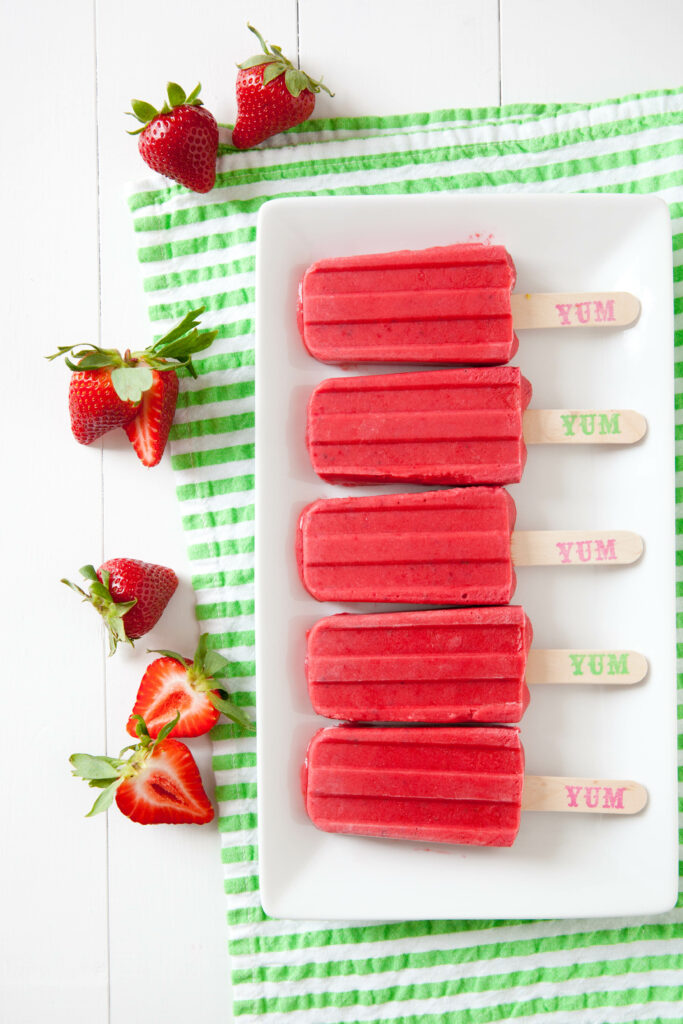 Vibrant Strawberry Ice Cream Popsicle Wallpaper Background