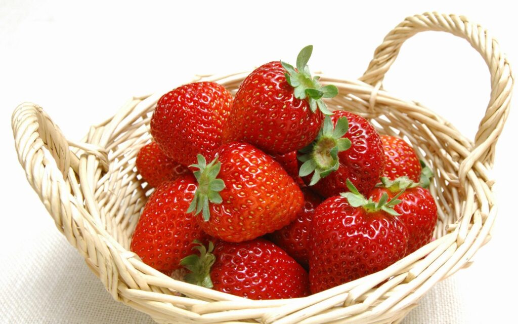 Vibrant Strawberry Wallpaper: Fresh Wicker Basket Background