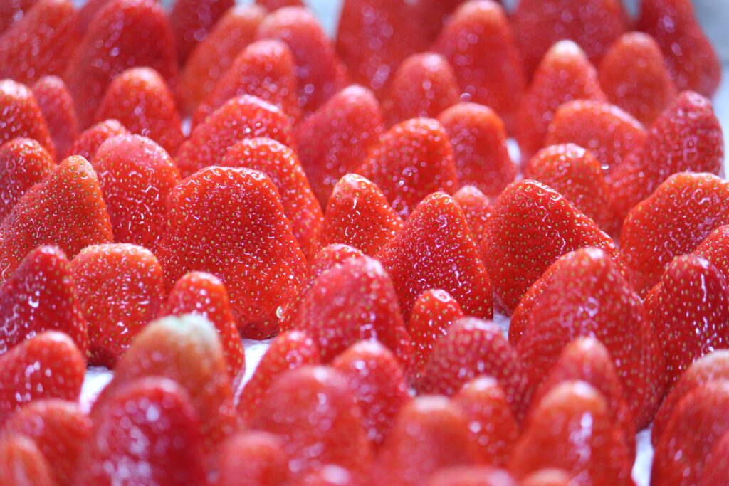 Vibrant Strawberry Wallpaper: Fresh & Creamy Milk Background