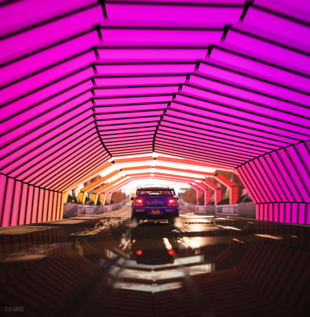Subaru Impreza WRX Racing in Vibrant Pink & Orange Tunnel Wallpaper