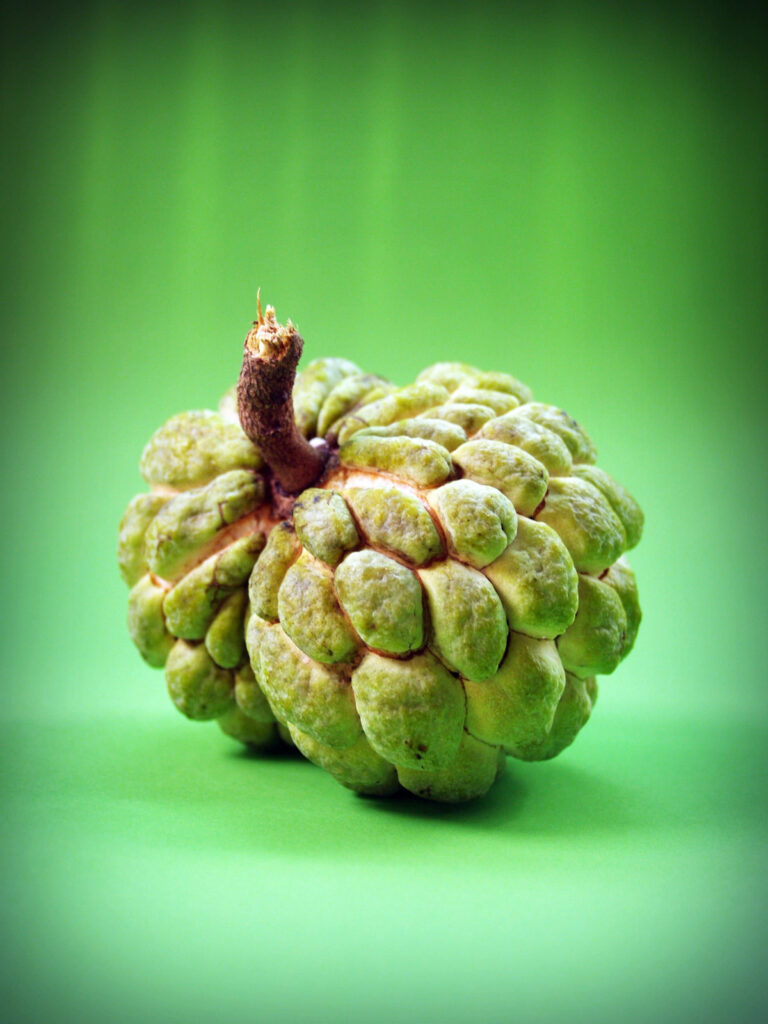 Majestic Sugar Apple Fruit Wallpaper: Textured Green Delight