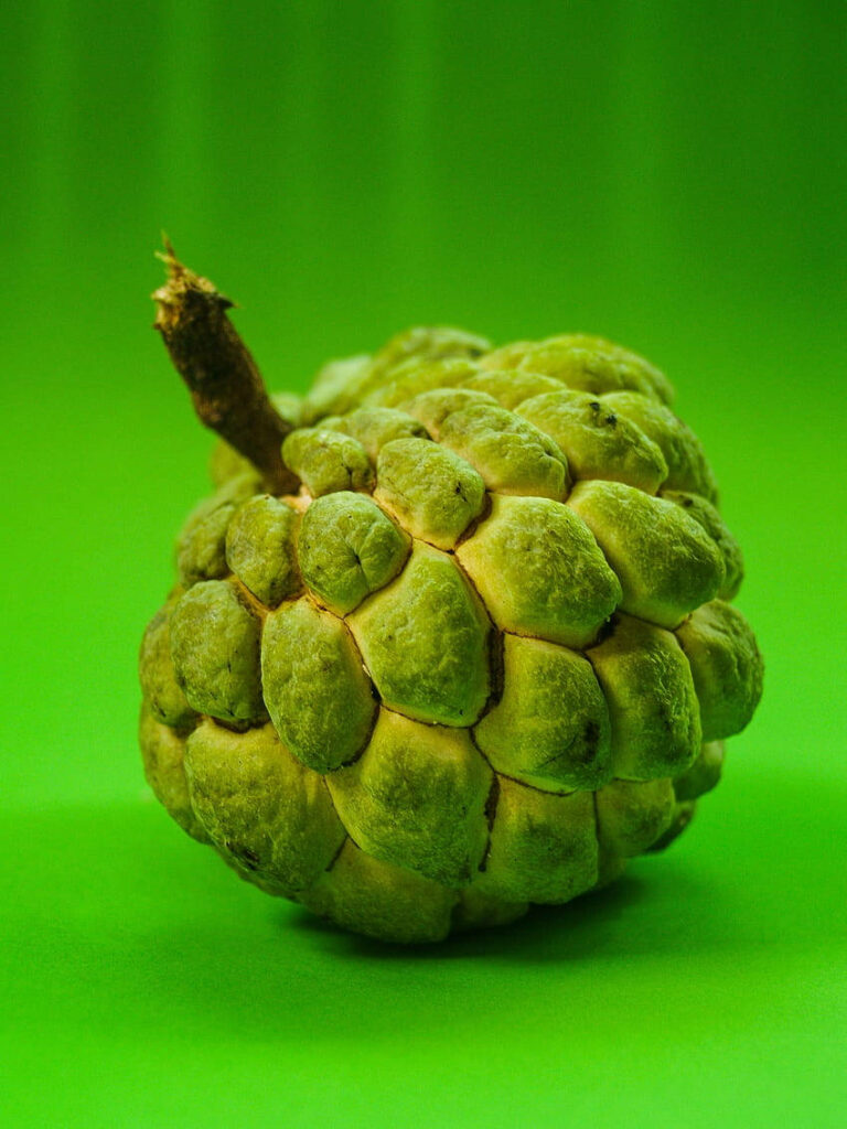 Vibrant Sugar Apple Photo on Green Background - Stunning Wallpaper
