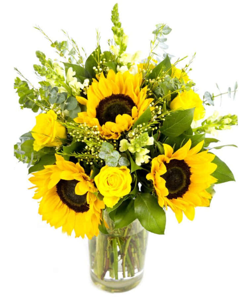 Cheerful Sunflowers & Yellow Roses in a Glass Vase - Lush Greenery Wallpaper