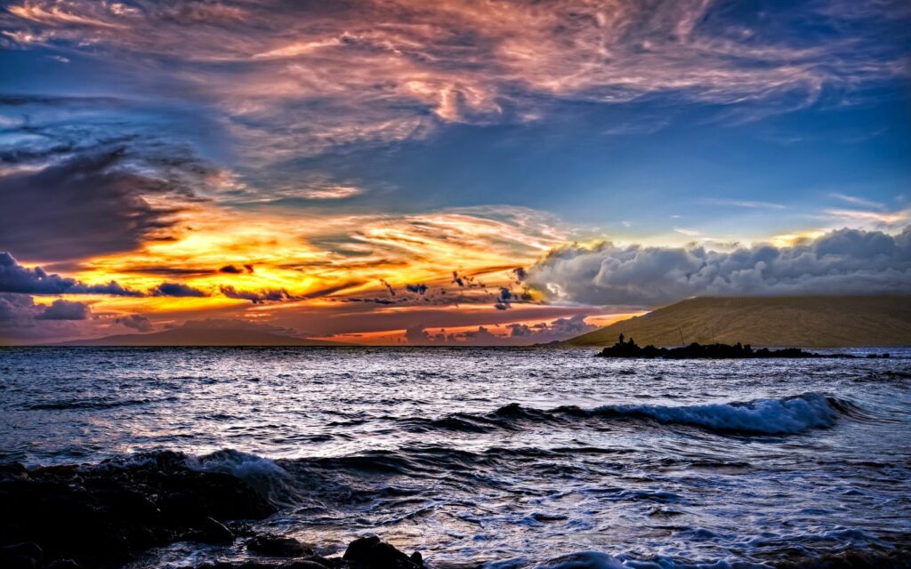 Vibrant sunset sea landscape with rolling waves dramatic sky colorful clouds horizon wallpaper