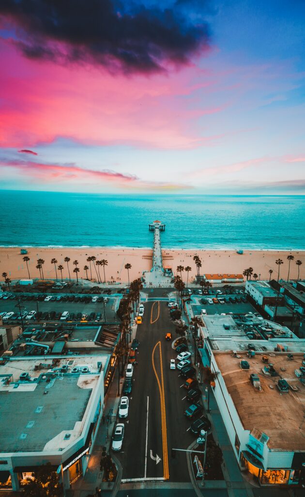 Vibrant Sunset Wallpaper: Manhattan Beach Pier & Skyline Scene