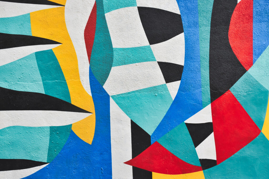 Vibrant Kaleidoscope of Abstract Shapes: An Artistic Wall. Wallpaper